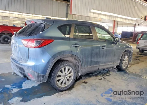 2015 Mazda Cx-5 Touring z USA, uszkodzony, nr VIN JM3KE2CY6F0501353